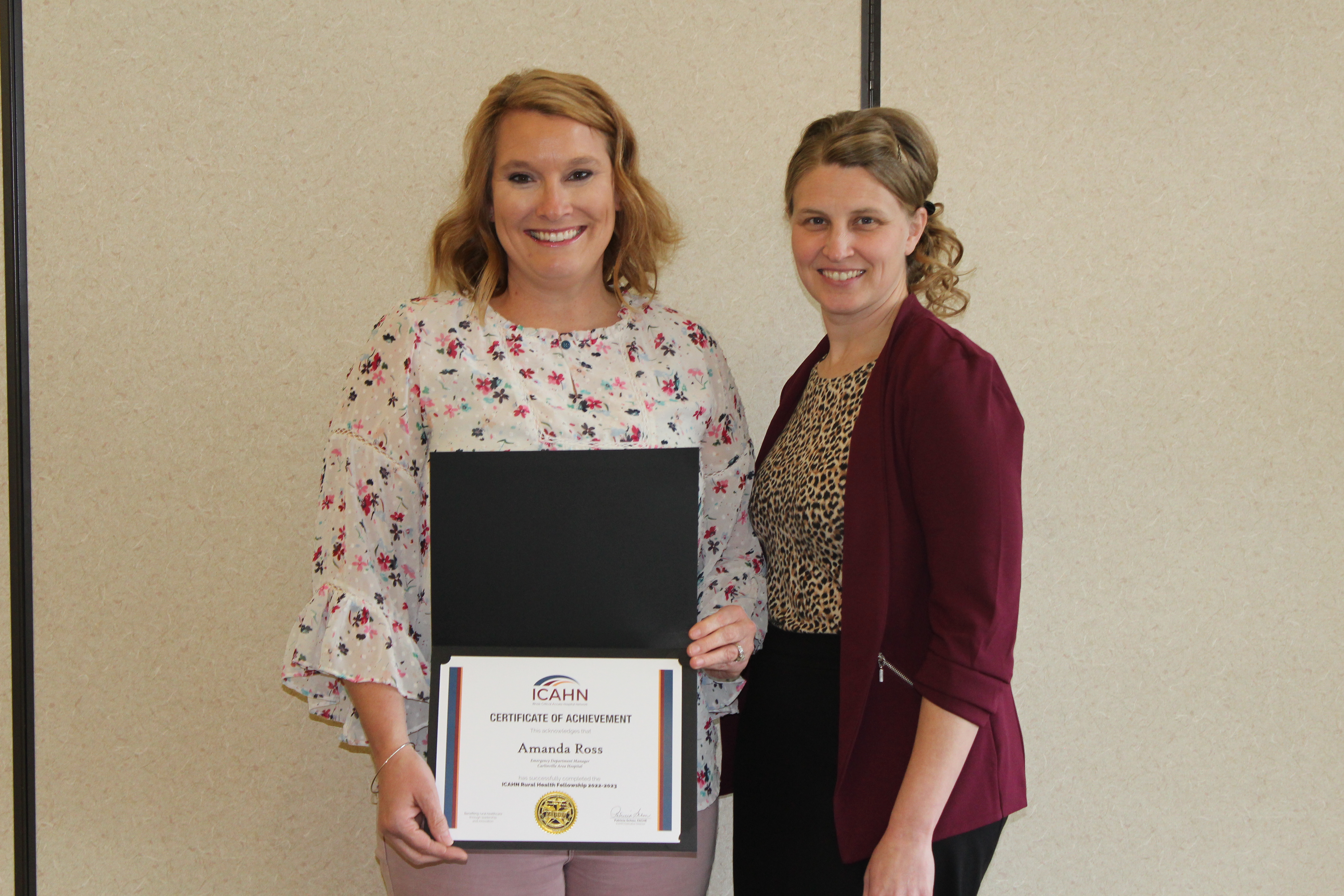 Amanda Ross honored with a certificate of achievement